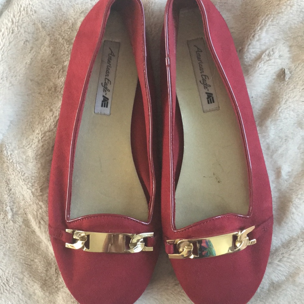 Womens American eagle red flats with gold buckle size 8.5